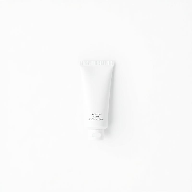 Plain white unlabeled tube of anti-itch cream on a white background